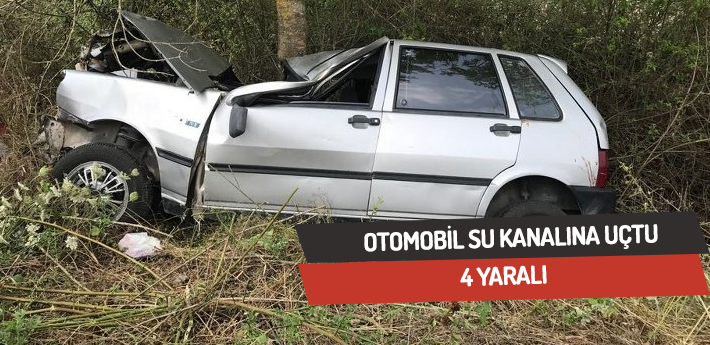 Otomobil su kanalına uçtu,4 yaralı